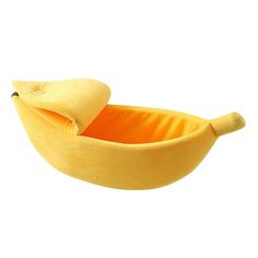 a banana shaped bed with a pillow on the top and bottom part in the shape of a boat