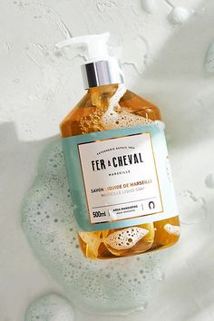 Formulated with a nourishing blend of coconut, sweet almond, olive, and argan oils, this perfumed soap keeps your skin feeling hydrated through frequent hand washing. Featuring scents that are equal parts elegant, invigorating, and refreshing, each is sure to leave a lasting impression. About Fer A ChevalNamed after the French term for 'horseshoe,' Fer a Cheval is the oldest Marseille soap factory that still uses traditional, age-old methods and recipes. The brand has been in operation since 185 Ingredients Photography, Soap Photography, Marseille Soap, Soap Labels, Liquid Hand Soap, Soap Packaging, Social Media Design Inspiration