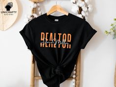 Elevate your real estate game with our Custom Realtor T-shirt. This personalized real estate tee, featuring your custom name, is the perfect gift for any dedicated realtor. Ideal for agent marketing attire, it combines professionalism and style, making it a must-have for your wardrobe. See more of our designs in our REAL ESTATE section: https://www.etsy.com/shop/unicraftydesigns/?etsrc=sdt&section_id=49847464 CHECK OUT MORE FOR OUR UNIQUE DESIGNS: unicraftydesigns.etsy.com SIZE & MATERIAL * Unisex T-shirt * Runs true to size * 100% cotton (fibre content may vary for different colours) SHIPPING & PRODUCTION TIME:  *Processing: 1-3 business days *USA 2 - 5 days CARE INSTRUCTIONS: * Wash inside out in warm/cold water. Do not bleach. * Tumble dry low. Do not iron directly on the design. FEEDBA Real Estate Shirts, Tshirt Custom, Realtor Gifts, Shirts Funny, Custom Name, Unisex T Shirt, Must Haves, Cold Water, Gender Neutral