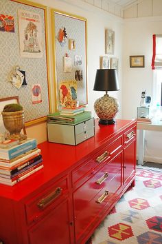 before and after photos of an old dresser with red paint on the bottom, then painted gold