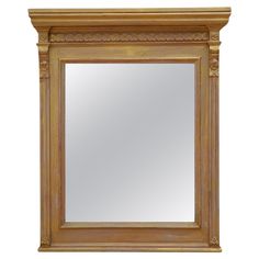 an old fashioned mirror is shown against a white background