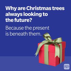 a red present box with a green ribbon on it and the words, why are christmas trees always looking to the future? because the present is beneath them