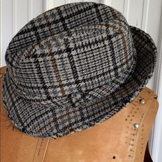 Brown, Grey, Black Checked Brim Hat Size 7 1/2-7 5/8” Looks Like Never Worn. Acrylic And Wool Blend. Winter’s Coming Casual Black Wool Felt Hat, Fitted Gray Hat With Short Brim, Casual Wide Brim Hat In Gray, Casual Wide Brim Gray Hat, Casual Gray Wide Brim Hat, Casual Flat Cap Felt Hat For Winter, Fitted Gray Wool Hat, Casual Wool Brimmed Cloche Hat, Casual Black Flat Cap Felt Hat