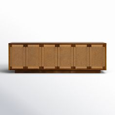 the sideboard is made out of wood and wicker