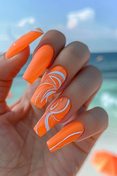 Brighten up your look with these vibrant orange beach nails, featuring eye-catching quilled towel patterns. These summer nail designs are a cheerful nod to sunny beach days and are perfect for a tropical vacation. For more fun beach nail designs, check out nailhow.com! Neon Orange Nails, Beach Nail Designs, Beach Nail, Orange Nail Designs, Fun Beach, Vacation Nails, Summer Nails Colors, Sunny Beach, Neon Nails