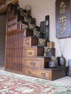 A kaidan step chest - Shibui Kotto - Japanese tansu are much more than items of furniture. Tansu, extraordinary and versatile wooden cabinetry, dating as far back as 7th-century Japan, represent a rich folk heritage unique in the world. Decorating House, Asian Interior, Asian Furniture, Attic Stairs, Japanese Furniture, Wooden Products, Chinese Furniture, Minimalist Life, Asian Decor