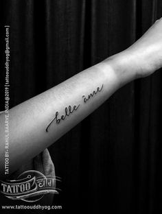 a person with a tattoo on their arm that says, hello love written in cursive writing