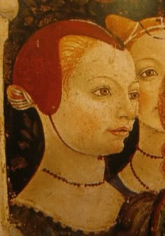 an old painting with two women on it's face and one is looking at the other