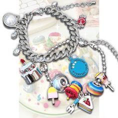 This charming bracelet features delightful dessert-themed charms that add a cute and youthful touch to any outfit. Perfect for enhancing your overall ensemble with a standout accessory, this bracelet is a must-have for anyone looking to add a bit of whimsy to their style.  Please note that the price includes one bracelet only. Charm Bracelet Kawaii, Silver Retro Charm Bracelet, Cheap Pink Novelty Charm Bracelet, Cheap Adjustable Kawaii Charm Bracelet, Male Steampunk, Novelty Nickel-free Metal Charm Bracelet, Steampunk Fashion Female, Tassel Earing, Steampunk Fashion Male