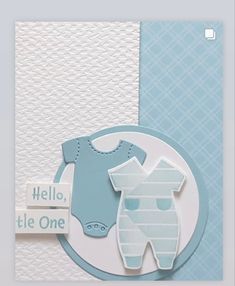 a card with a baby's bib on it