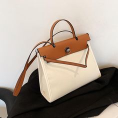 Contrasting Color Design Kelly Bag-The Korean Fashion White Portable Shoulder Bag For Everyday Use, White Handheld Shoulder Bag For Office, Everyday White Portable Shoulder Bag, Everyday Portable White Shoulder Bag, Classic White Mobile Phone Bag, Trendy White Shoulder Bag For Travel, Trendy White Shoulder Travel Bag, Modern White Shoulder Bag With Mobile Phone Holder, Modern White Shoulder Bag For Summer