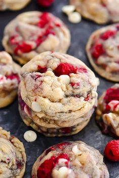 raspberry white chocolate chip cookies are stacked on top of each other and ready to be eaten