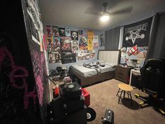 a bedroom with lots of graffiti on the walls