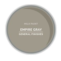 a gray paint can with the words empire gray general finishes in white and black on it