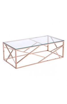 a glass and metal coffee table with a geometric design on the top, against a white background