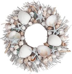 a wreath made out of sea shells and other seashells on a white background