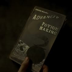 a person holding up a book in their hand with the title'advanced potton making'written on it