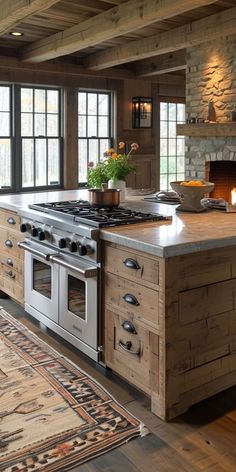 a kitchen with an oven, stove and rug in the middle of it on top of a hard wood floor