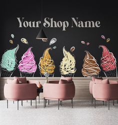 an ice cream shop with pink chairs and large wall mural in the background that says your shop name