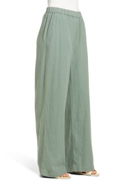 Cut from a breezy linen blend with a high waist and wide legs, these pull-on pants are a cool remake of a closet classic. Style Name:Caslon Wide Leg Pull-On Pants (Regular & Petite). Style Number: 6171711. Spring Linen Pull-on Bottoms, Linen Wide Leg Pants For Daywear, Spring Linen Pants With Pull-on Style, Spring Linen Pull-on Pants, Wide Leg Full Length Daywear Pants With Pockets, Full Length Wide Leg Pants With Pockets For Daywear, Wide Leg Full Length Pants With Pockets, Solid Wide Leg Pants For Daywear, Full Length Wide Leg Pants For Daywear