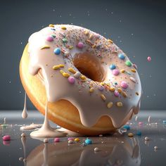 a donut with white icing and sprinkles on a reflective surface