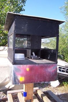 the back end of a truck with a stove on it