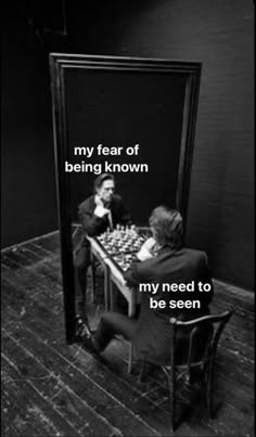 two people sitting at a table in front of a mirror with the words, my fear of being known