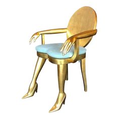 a golden chair with a blue cushion on it's back and arms stretched out to the side