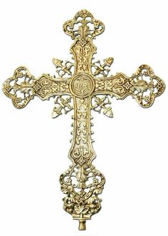 an ornate gold cross on a white background