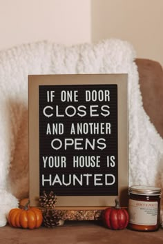 a sign that says if one door closes and another opens your house is haunted