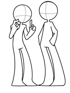 two people standing next to each other with one pointing at the other's head