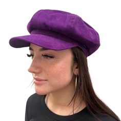 Our new CRAGGI Baker Boy Hat is made from a fabulous Purple Velvet fabric with a matching lining inside to prevent any scratching.The elasticated fitting will help you brave the wind and makes it one size fits all. This hat is a perfect fashion accessory for a day around town,holidays,Festivals and nights out with friends. Whether you're on Campus ,outdoors walking or running errands it's the perfect cap to match with your outfits. This cap is size 56-60cm with an elasticated back for a perfect Trendy Adjustable Brimmed Beret, Adjustable Beret With Short Brim, Trendy One-size Beret Cap, Trendy One Size Fits Most Beret Cap, Trendy One-size-fits-most Beret Cap, Trendy One-size Flat Cap, Trendy One Size Flat Cap, Trendy One Size Fits Most Beret, Adjustable Visor Beret For Winter