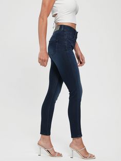 Feel extra comfortable in your own skin with these special jeans. Featuring a curve-hugging denim design, high-rise waist, five-pocket construction, dual waist buttons and triangle logo at the back pocket. Modern High Rise Blue Jeans, High Rise Denim Blue Jeans, Modern High Waist Denim Jeans, Modern High-rise Denim Bottoms, Modern High Rise Denim Bottoms, Modern Mid-rise Blue Jeans, Modern Blue Mid-rise Jeans, Modern High-rise Denim Blue Jeans, Modern Blue Bottoms For Everyday