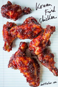 chicken wings with bbq sauce on top and the words burn fried chicken written above them