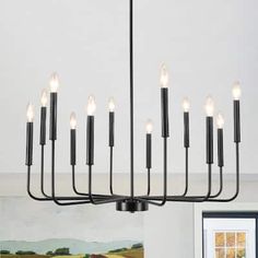 a black chandelier hanging from the ceiling