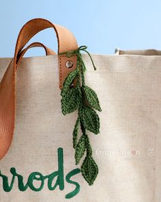 there is a bag that has some leaves on it and the words brods written in green