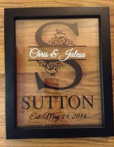 an image of a wooden frame with the words, wedding date and name on it