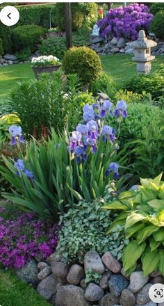 Rock Path Landscaping, Rock Flower Beds Backyard Designs, Semi Circle Flower Bed, Goth Garden Design, Plants Around Deck, Landscaping Around Deck Backyard, Landscaping With Planters, Pnw Landscaping Ideas, Under Tree Landscaping