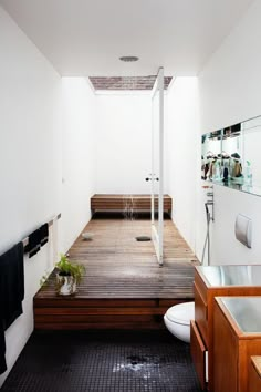 an instagram photo taken from the inside of a room with a wooden floor and white walls