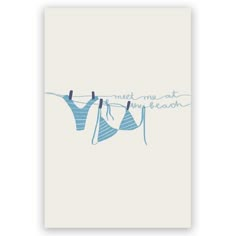 two clothes hanging on a line with the words meet me next to it in blue ink