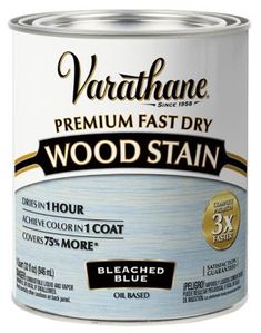 a can of wood stain that is white and has black lettering on the bottom corner