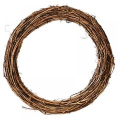 a close up of a wreath made out of branches on a white background with clippings