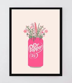 a pink can with flowers in it and the words dr pepper written on it is hanging from