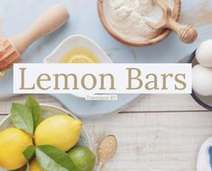 lemon bars on a table with ingredients to make them