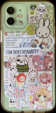 an open cell phone with stickers on it's back cover and the words car seat headrest