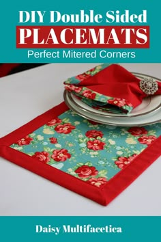 a placemat is sitting on top of a table with red napkins and silverware