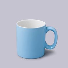 a light blue coffee mug on a gray background