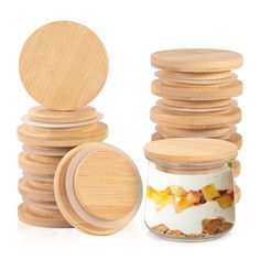 a jar filled with food next to a stack of wooden discs