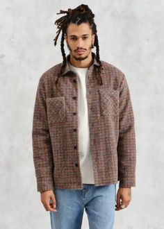 Year-round staple, returns in a new wool mix with a burgundy, blue and orange check design and features environmentally-friendly Corozo nut buttons and front patch pockets. Is it a shirt? Is it a mid-layer? Is it a jacket? It's all of those things and much, much more. 60% polyester, 30% wool, 10% acrylic Wash on cold or dry clean Cool Clothing, Check Design, A Jacket, Cheque Design, Scarf Men, Blue And Orange, Mens Skin Care, Sweater Pants, Men's Grooming