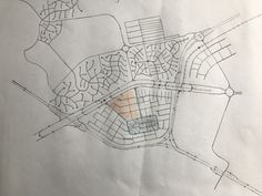 a drawing of a city with lots of streets and buildings on it's map